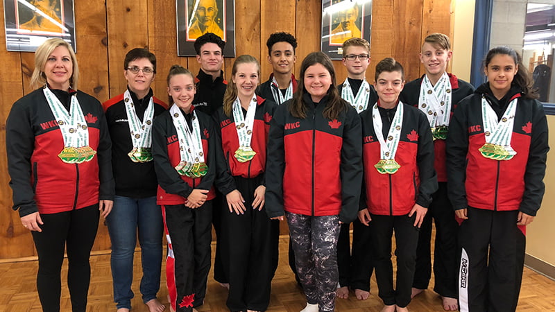 Bernardo Karate Tournament team posing with their medals