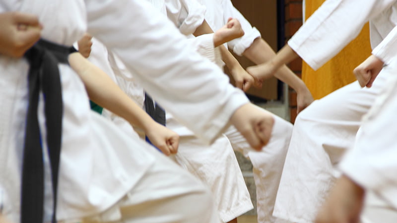 close up of students doing kata's