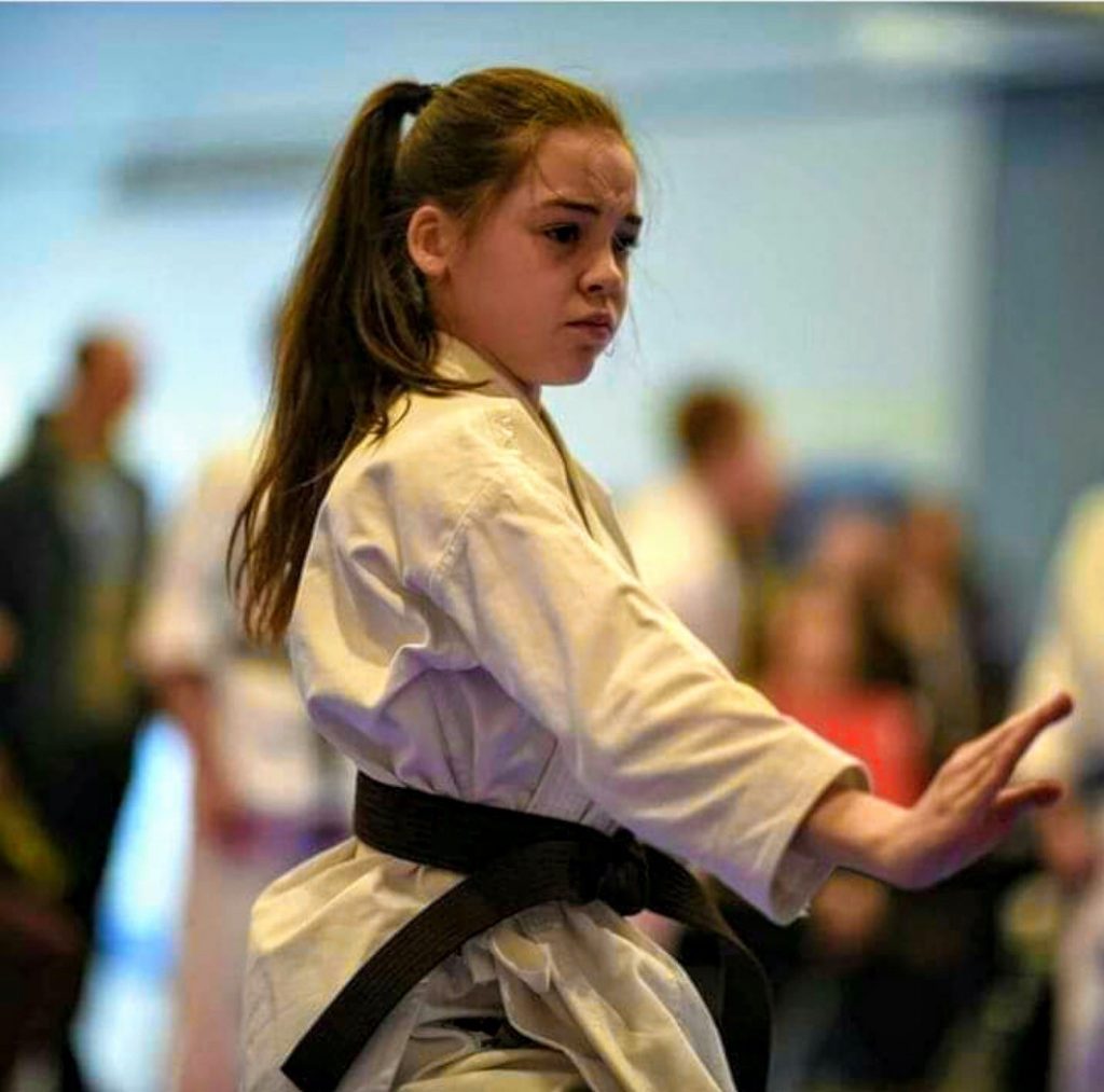 black_belt_news Bernardo Karate student posing